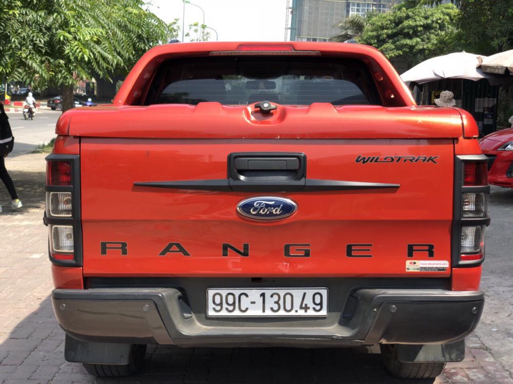 Ford Ranger Wildtrak 2.2AT 2014 - Bán xe Ford Ranger Wildtrak 2.2AT đời 2014 màu cam, giá tốt, nhập khẩu nguyên chiếc