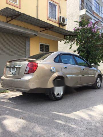 Daewoo Lacetti 2004 - Chính chủ bán Daewoo Lacetti sản xuất năm 2004, màu vàng