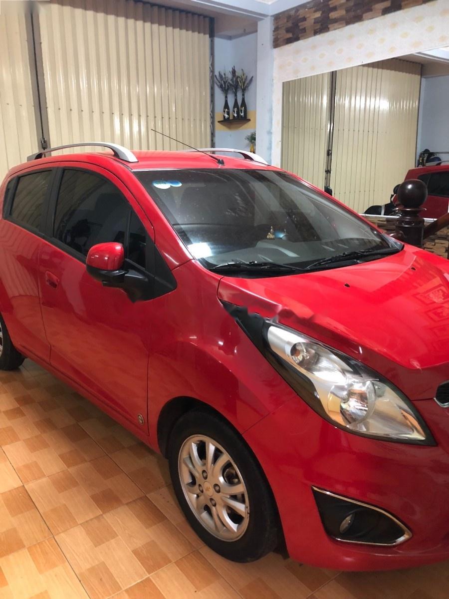 Chevrolet Spark LTZ 1.0 AT 2014 - Cần bán gấp Chevrolet Spark LTZ sản xuất 2014, màu đỏ, nhập khẩu, 300 triệu