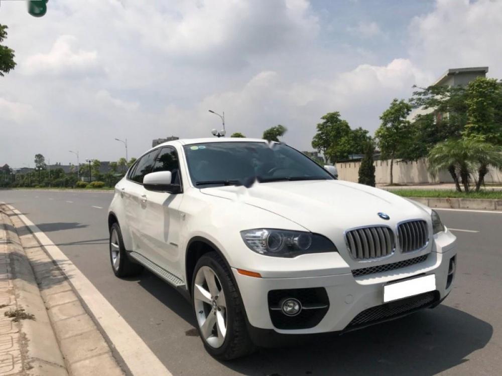 BMW X6 5.0i XDrive 2010 - Cần bán BMW X6 5.0i XDrive đời 2010, màu trắng, xe nhập