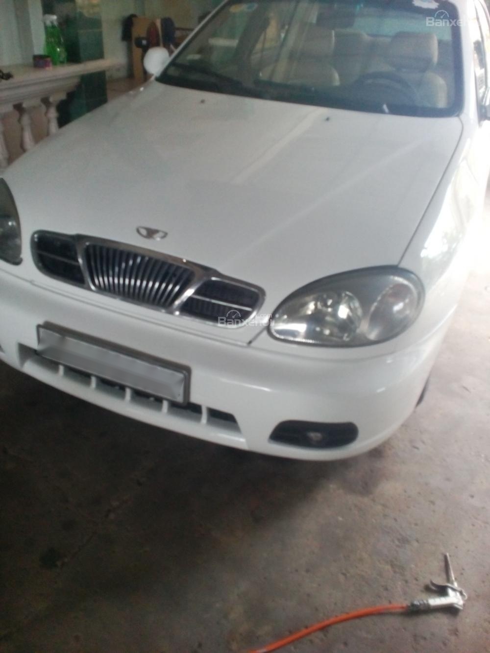 Daewoo Lanos 2003 - Cần bán lại xe Daewoo Lanos sx đời 2003, màu trắng xe gia đình, giá tốt 125tr