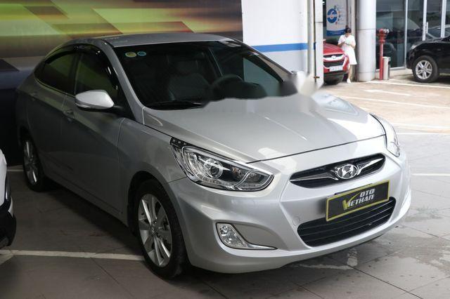 Hyundai Accent   blue 1.4AT  2013 - Bán ô tô Hyundai Accent blue 1.4AT đời 2013, màu bạc