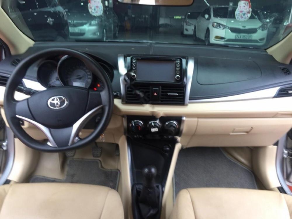 Toyota Vios 1.5E 2015 - Cần bán lại xe Toyota Vios 1.5E đời 2015, màu bạc