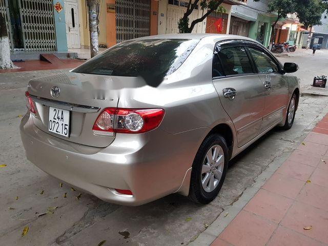 Toyota Corolla altis 2013 - Chính chủ bán Toyota Corolla altis đời 2013, màu vàng cát