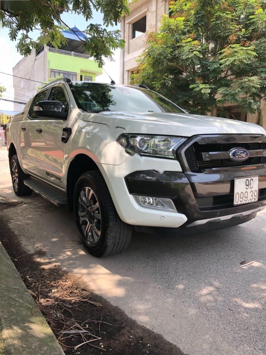 Ford Ranger Wildtrak 3.2L 4x4AT 2015 - Cần bán lại xe Ford Ranger Wildtrak 3.2L 4x4AT 2015, màu trắng, nhập khẩu như mới, giá chỉ 777 triệu