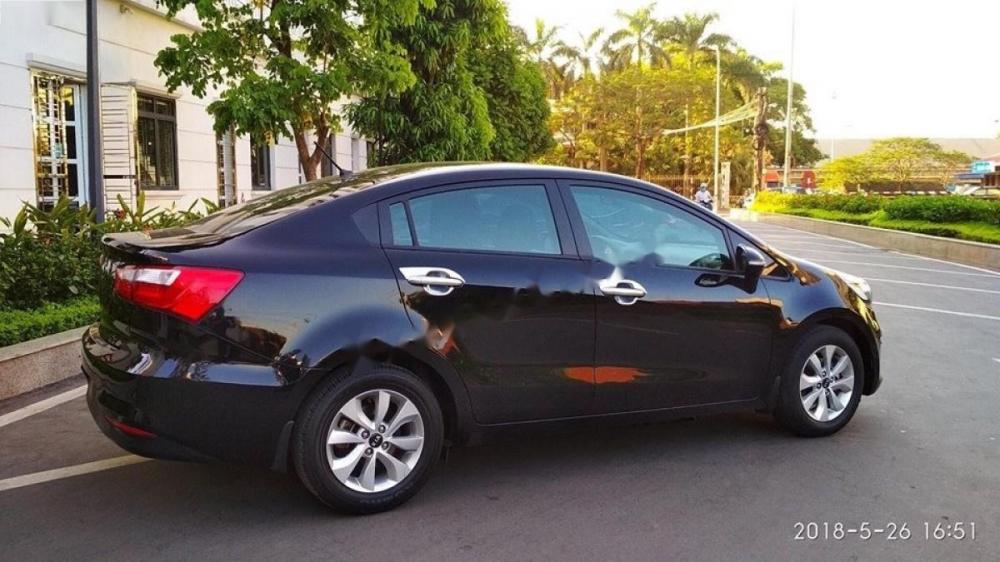 Kia Rio 1.4 AT 2015 - Bán Kia Rio 1.4 AT 2015, màu đen, xe nhập chính chủ