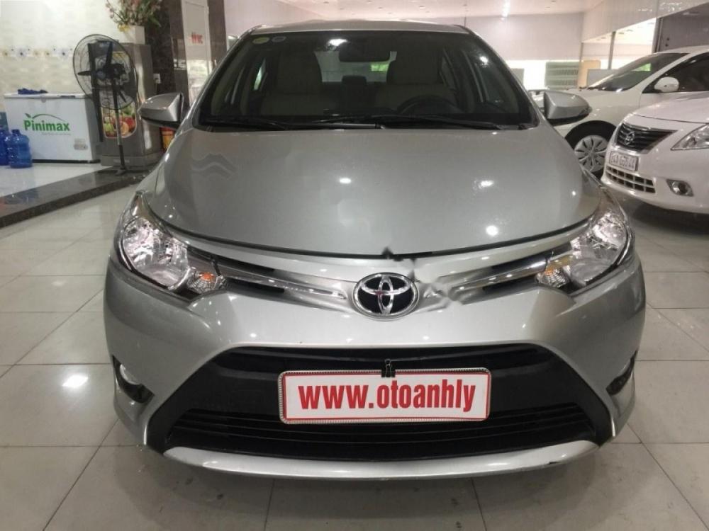 Toyota Vios 1.5E 2015 - Cần bán lại xe Toyota Vios 1.5E đời 2015, màu bạc