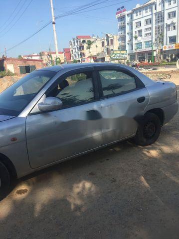 Daewoo Nubira 1999 - Cần bán Daewoo Nubira sản xuất 1999, màu bạc