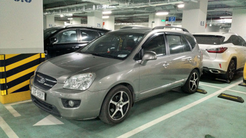 Kia Carens   2.0 MT  2010 - Chính chủ bán Kia Carens 2.0 MT sản xuất năm 2010, màu xám