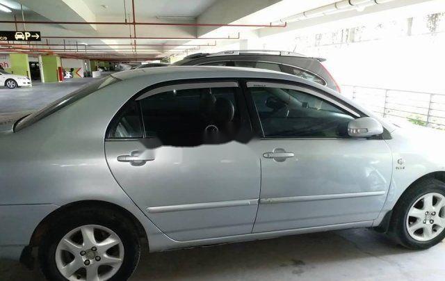 Toyota Corolla altis 2004 - Bán ô tô Toyota Corolla Altis đời 2004, màu bạc chính chủ, giá tốt