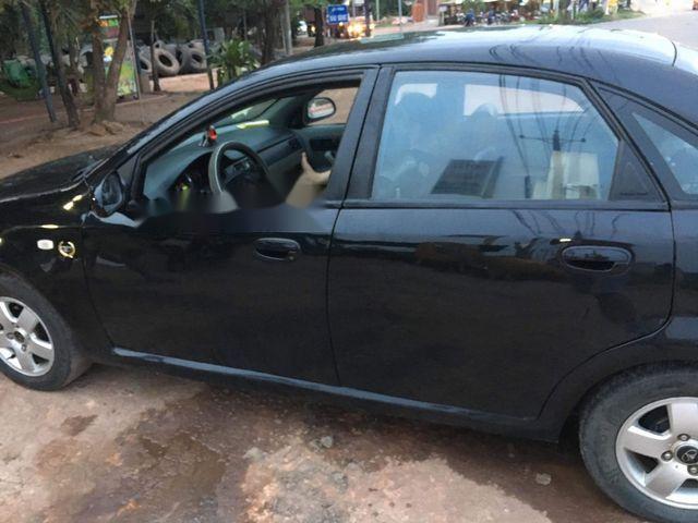 Daewoo Lacetti 2004 - Gia đình bán lại xe Daewoo Lacetti đời 2004, màu đen