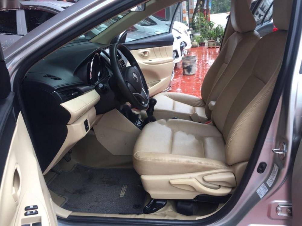 Toyota Vios 1.5E 2015 - Cần bán lại xe Toyota Vios 1.5E đời 2015, màu bạc