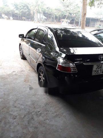 Toyota Vios 2009 - Bán ô tô Toyota Vios sản xuất năm 2009, màu đen số sàn