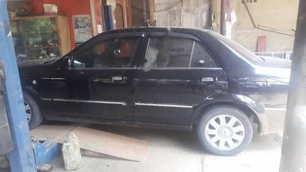 Ford Laser 2004 - Cần bán Ford Laser đời 2004, màu đen, giá tốt