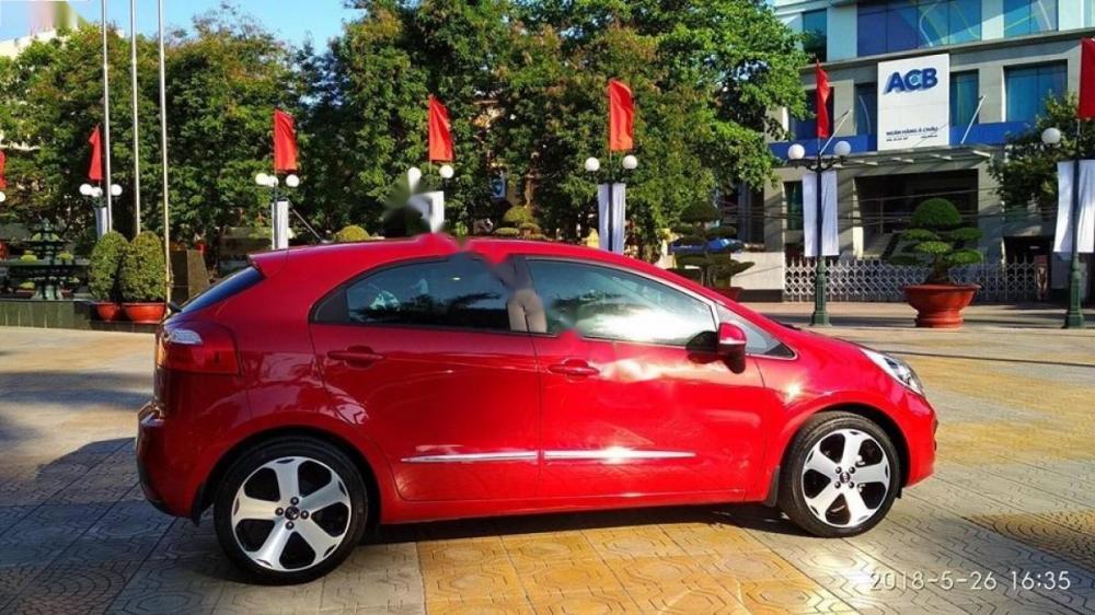 Kia Rio 1.4 AT 2014 - Bán Kia Rio 1.4 AT năm 2014, màu đỏ, xe nhập