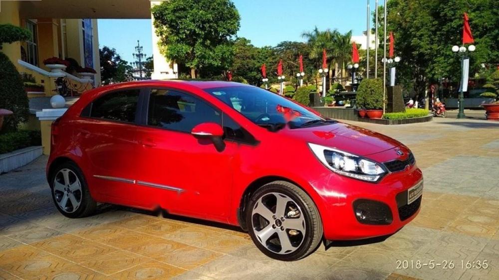 Kia Rio 1.4 AT 2014 - Bán Kia Rio 1.4 AT năm 2014, màu đỏ, xe nhập