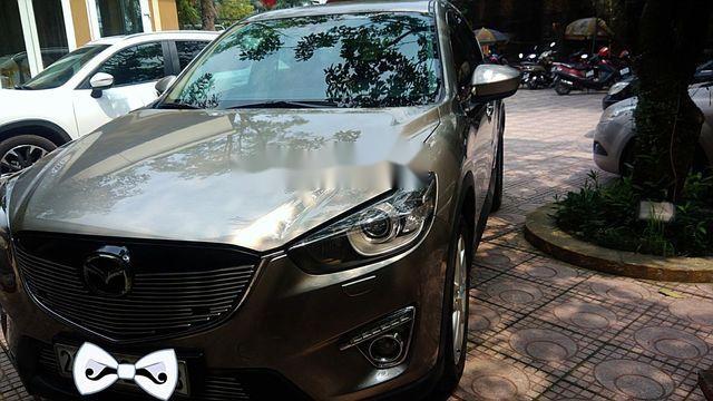Mazda CX 5 2014 - Chính chủ bán Mazda CX 5 năm sản xuất 2014, màu vàng cát