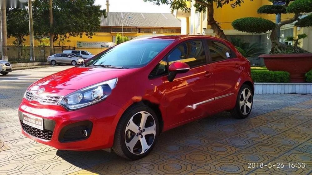 Kia Rio 1.4 AT 2014 - Bán Kia Rio 1.4 AT năm 2014, màu đỏ, xe nhập