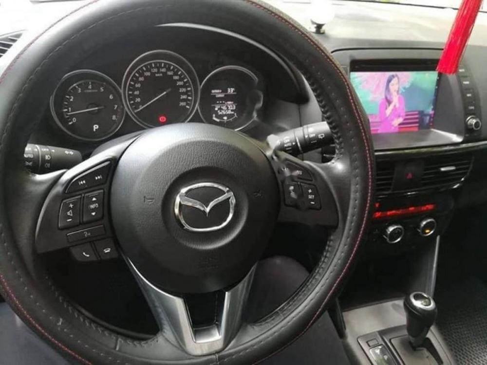 Mazda CX 5 2014 - Cần bán xe Mazda CX 5 đời 2014, màu vàng số tự động giá cạnh tranh