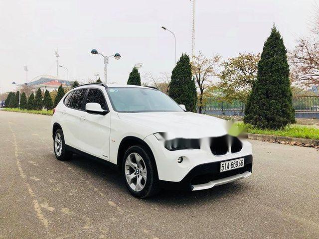 BMW X1 2011 - Bán xe BMW X1 đời 2011, màu trắng