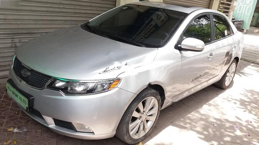 Kia Forte SLi 1.6 AT 2010 - Bán ô tô Kia Forte SLi 1.6 AT đời 2010, màu bạc, nhập khẩu, 395 triệu