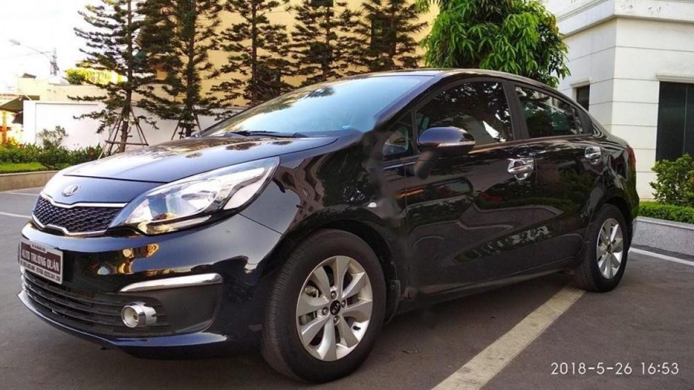 Kia Rio 1.4 AT 2015 - Bán Kia Rio 1.4 AT 2015, màu đen, xe nhập chính chủ