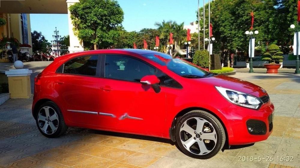 Kia Rio 1.4 AT 2014 - Bán Kia Rio 1.4 AT năm 2014, màu đỏ, xe nhập