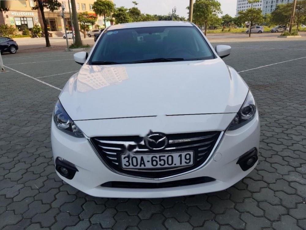 Mazda 3 2015 - Cần bán gấp Mazda 3 sản xuất năm 2015, màu trắng, giá tốt