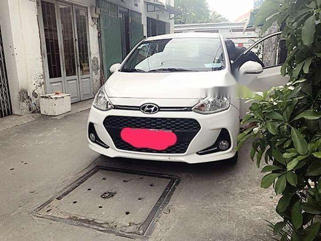 Hyundai Grand i10   AT  2017 - Cần bán lại xe Hyundai Grand i10 AT sản xuất 2017, màu trắng 