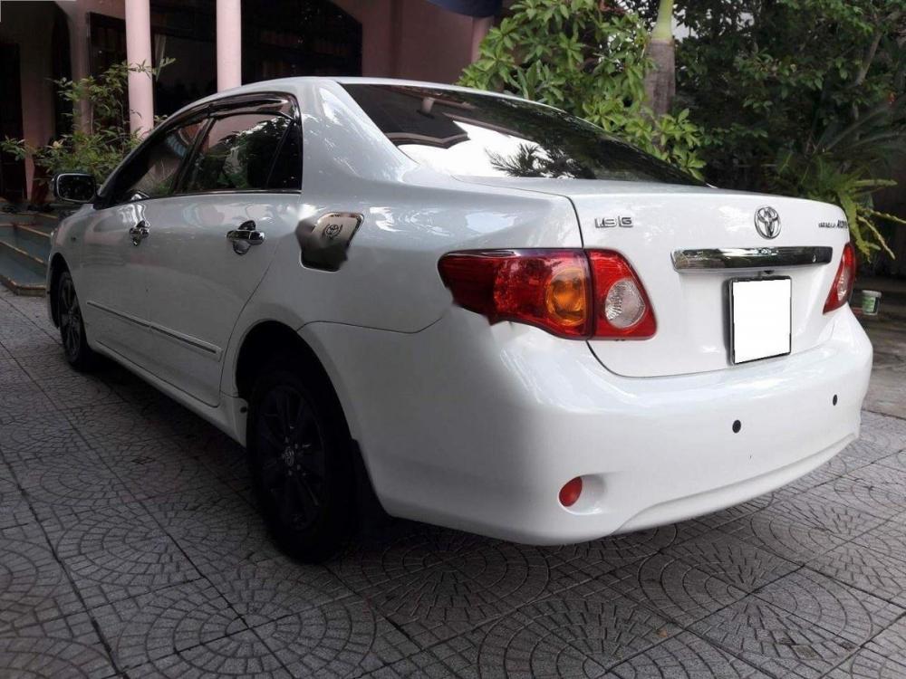 Toyota Corolla altis 1.8G MT 2009 - Bán xe Toyota Corolla altis 1.8G sản xuất 2009, màu trắng 