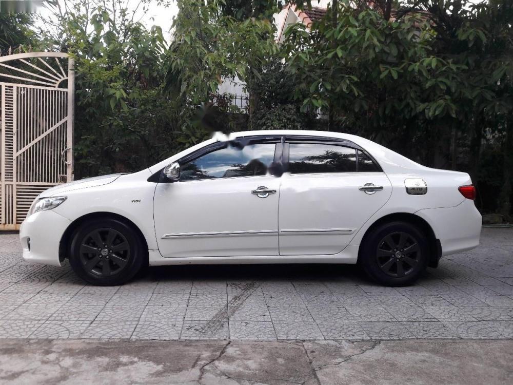 Toyota Corolla altis 1.8G MT 2009 - Bán xe Toyota Corolla altis 1.8G sản xuất 2009, màu trắng 