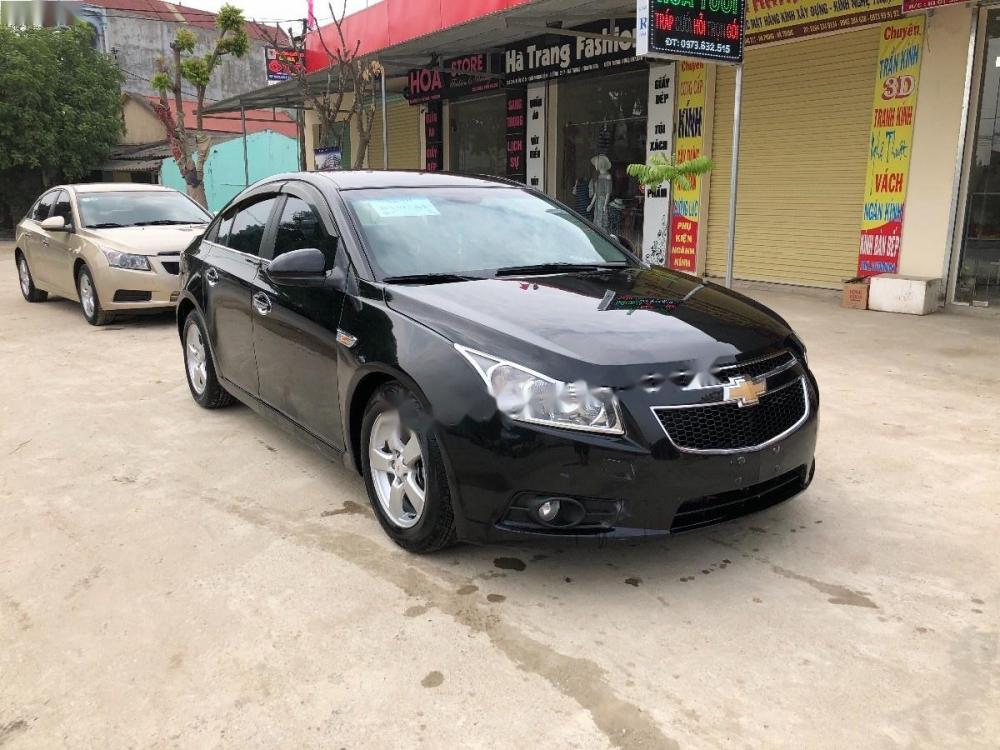 Chevrolet Cruze LT  2010 - Bán Chevrolet Cruze LT sản xuất 2010, màu đen giá cạnh tranh