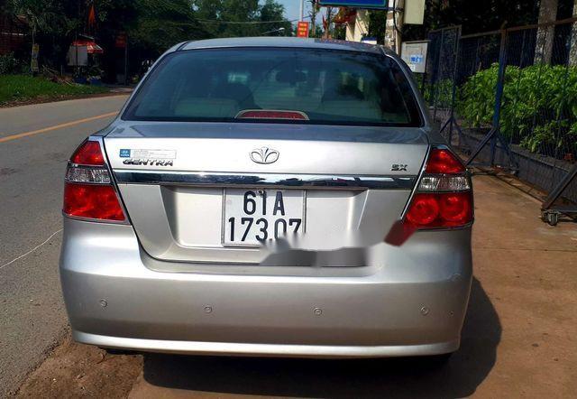 Daewoo Gentra    2011 - Cần bán gấp Daewoo Gentra đời 2011, màu bạc, giá chỉ 235 triệu