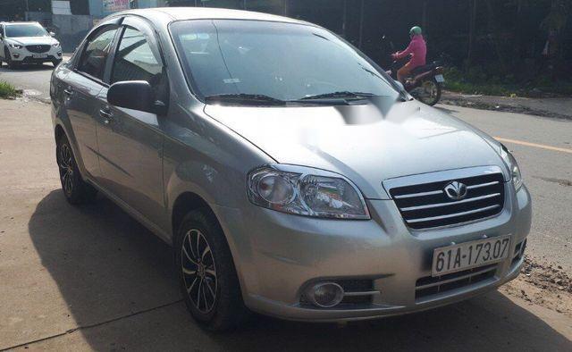 Daewoo Gentra   2011 - Cần bán Daewoo Gentra năm 2011, màu bạc xe gia đình, giá 235tr