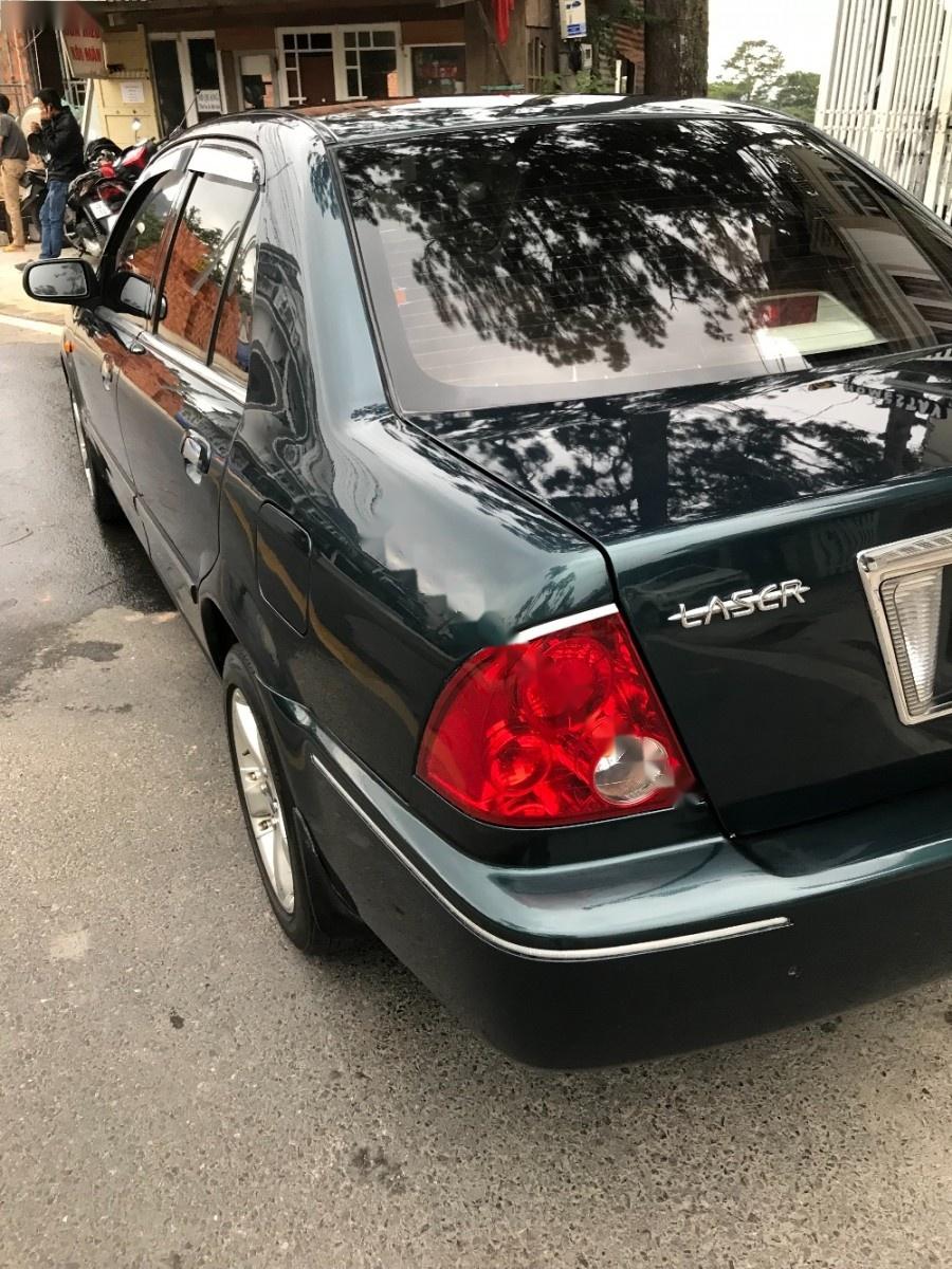 Ford Laser GHIA 2003 - Bán xe Ford Laser GHIA sản xuất 2003, màu xanh lam xe gia đình