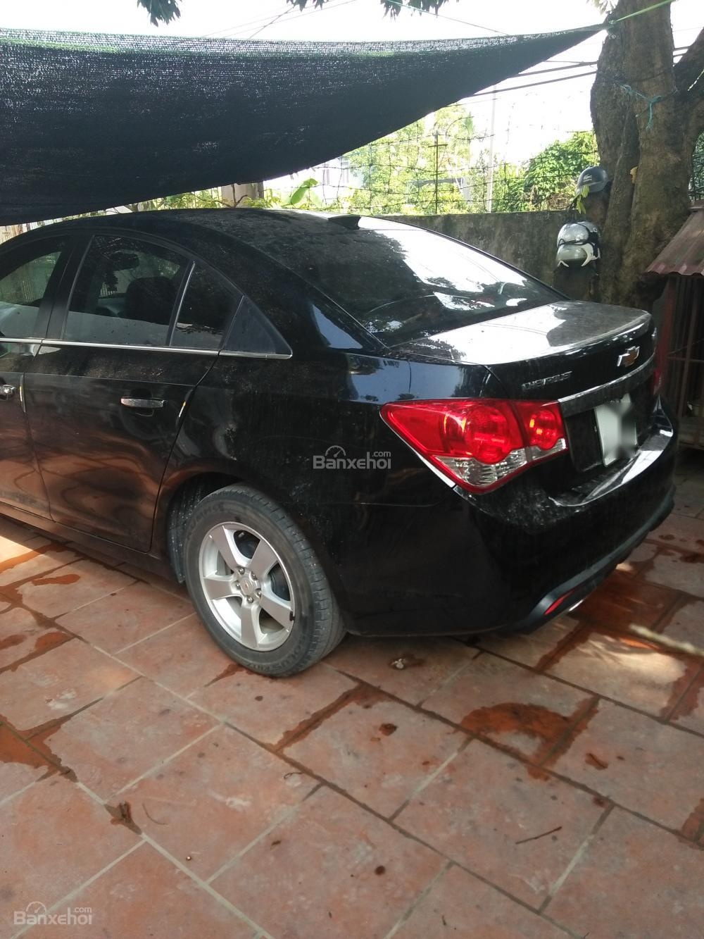 Chevrolet Cruze LS 2013 - Bán xe Chevrolet Cruze LS sản xuất 2013, màu đen xe gia đình