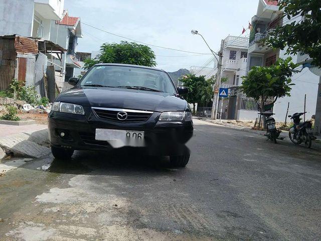 Mazda 626 2002 - Cần bán lại xe Mazda 626 sản xuất 2002, màu đen, 175 triệu