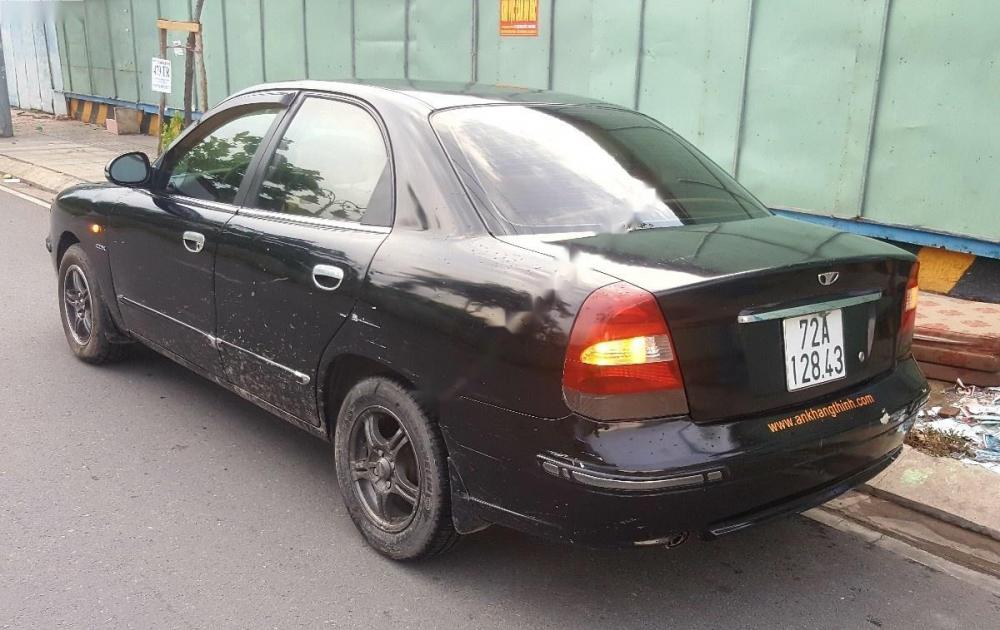 Daewoo Nubira CDX 2.0 1998 - Cần bán xe Daewoo Nubira CDX 2.0 đời 1998, màu đen xe gia đình