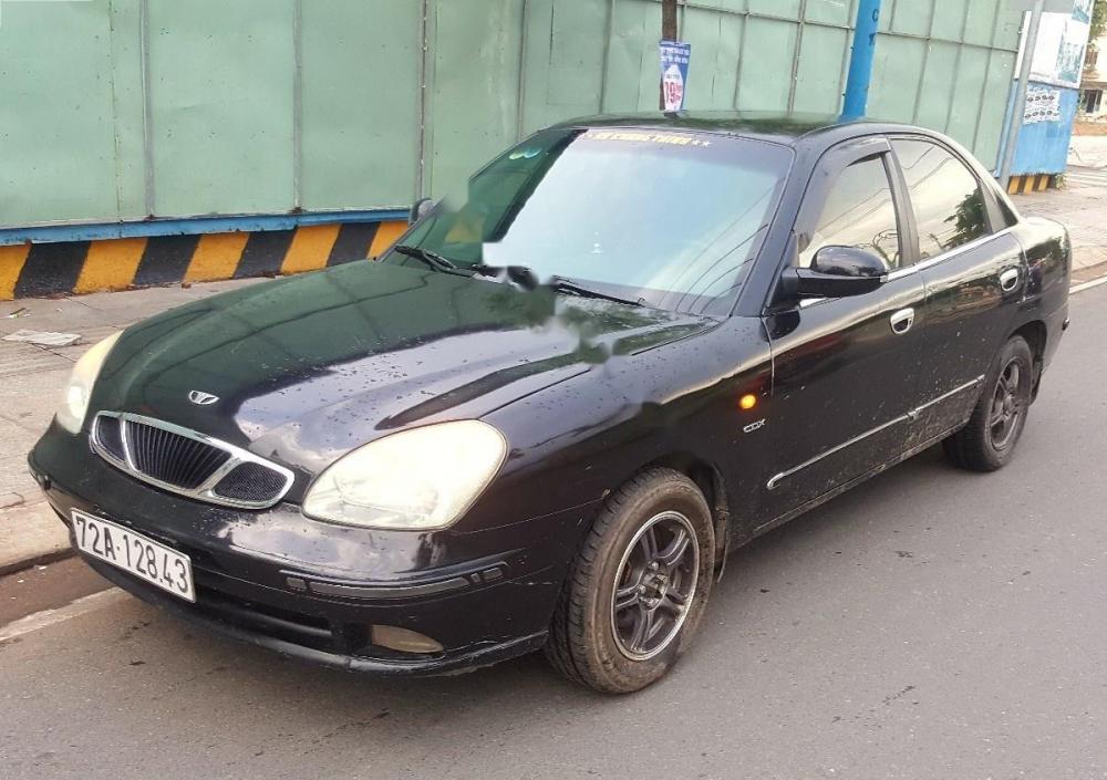 Daewoo Nubira CDX 2.0 1998 - Cần bán xe Daewoo Nubira CDX 2.0 đời 1998, màu đen xe gia đình