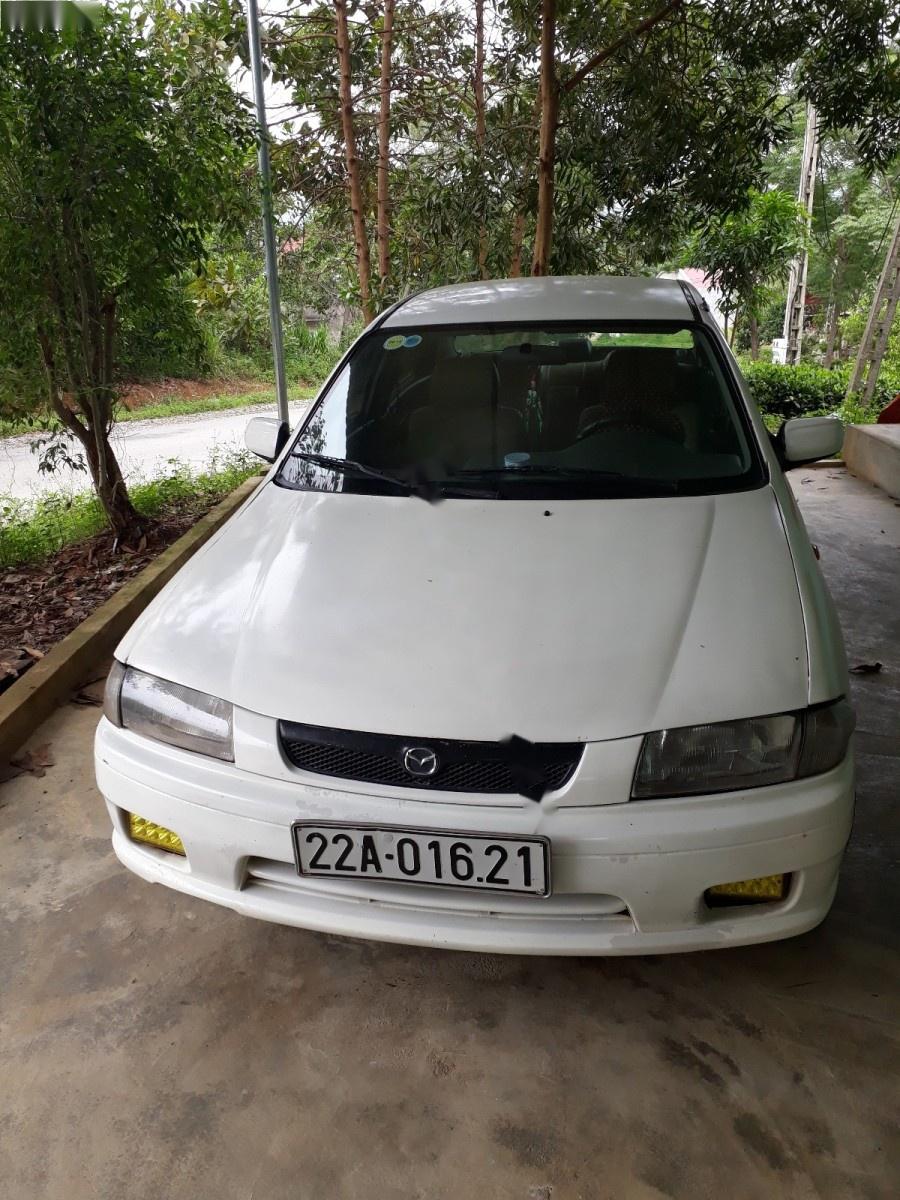 Mazda 323 GLXi 1.6 MT 2000 - Bán ô tô Mazda 323 GLXi 1.6 MT sản xuất năm 2000, màu trắng, nhập khẩu nguyên chiếc chính chủ giá cạnh tranh