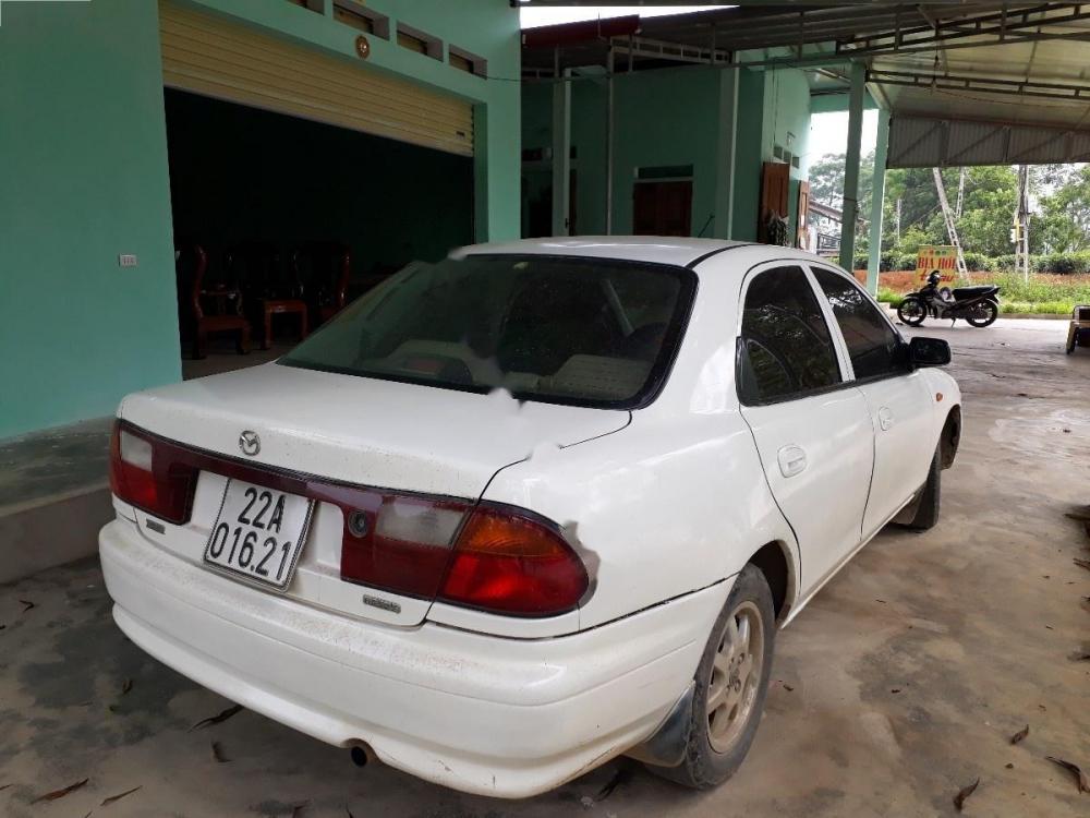 Mazda 323 GLXi 1.6 MT 2000 - Bán ô tô Mazda 323 GLXi 1.6 MT sản xuất năm 2000, màu trắng, nhập khẩu nguyên chiếc chính chủ giá cạnh tranh