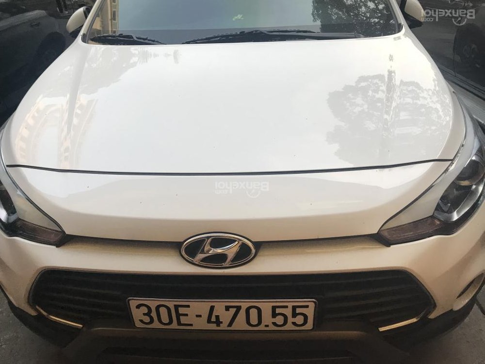 Hyundai i20 Active 2015 - Cần bán lại xe Hyundai i20 Active sản xuất năm 2015, màu trắng, xe nhập  