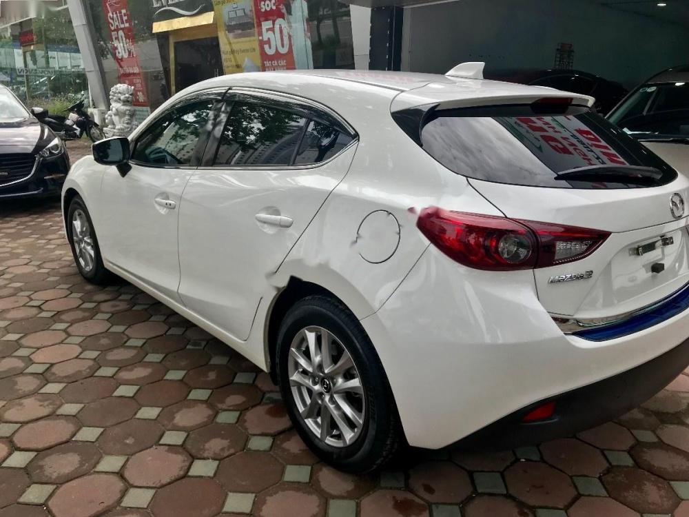 Mazda 3 2016 - Cần bán gấp Mazda 3 năm 2016, màu trắng, giá 665tr