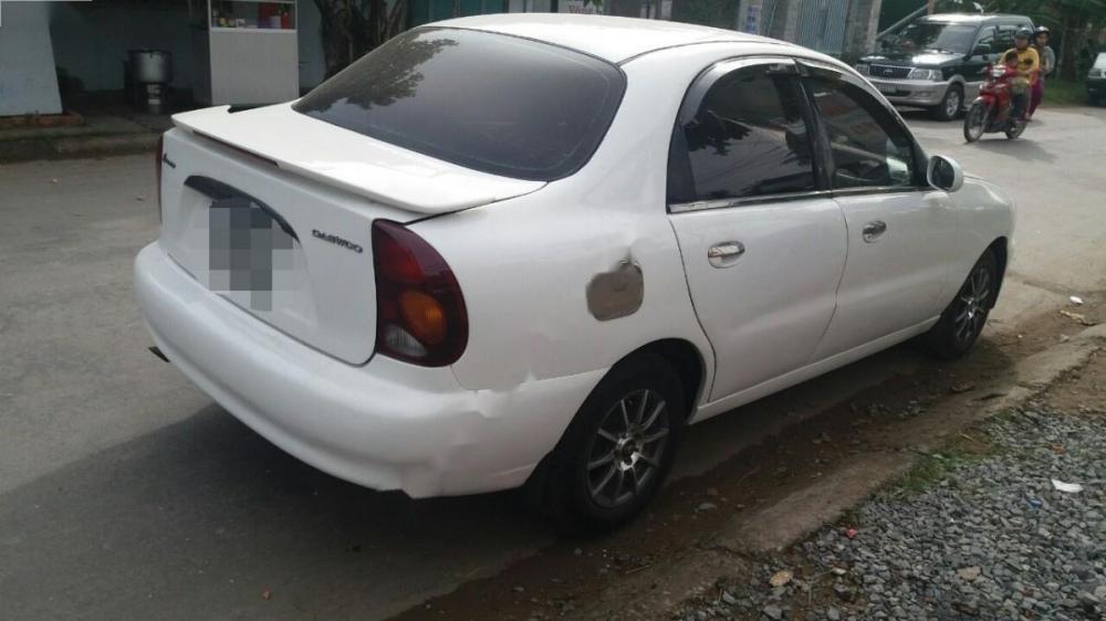 Daewoo Lanos 2002 - Bán Daewoo Lanos đời 2002, màu trắng còn mới, giá chỉ 80 triệu