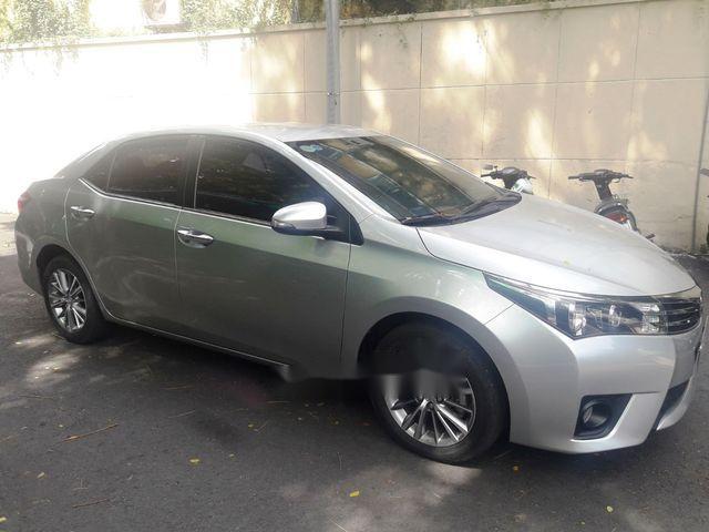 Toyota Corolla altis 1.8 AT  2017 - Bán xe Toyota Corolla altis 1.8 AT sản xuất năm 2017, màu bạc còn mới, giá tốt