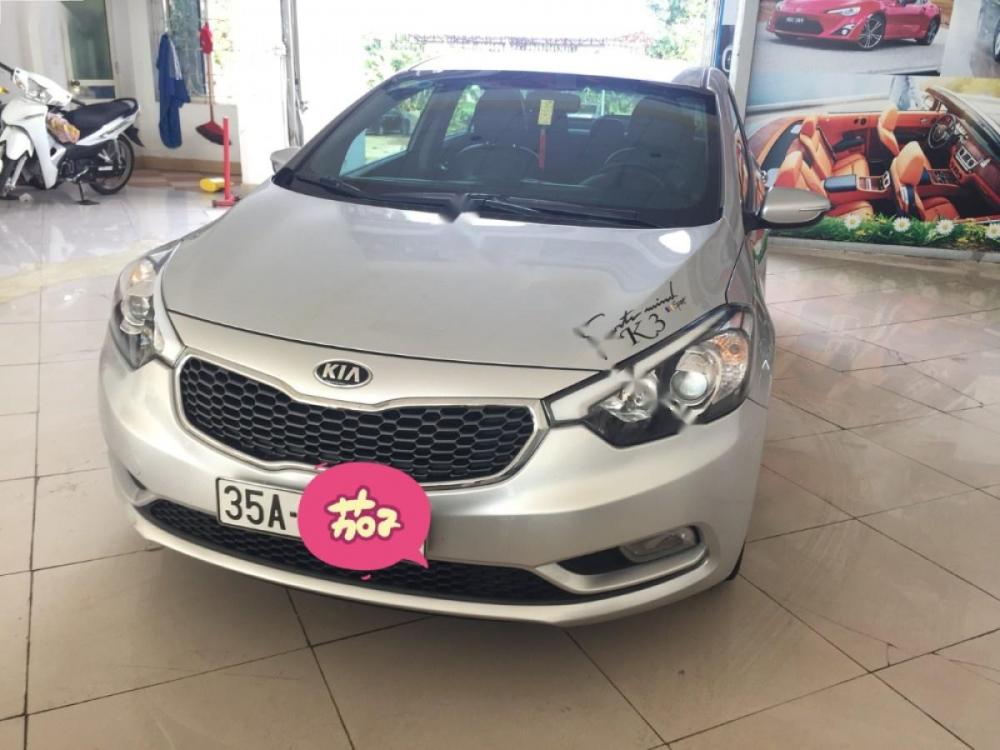 Kia K3 MT 2014 - Bán Kia K3 MT sản xuất năm 2014, màu bạc chính chủ