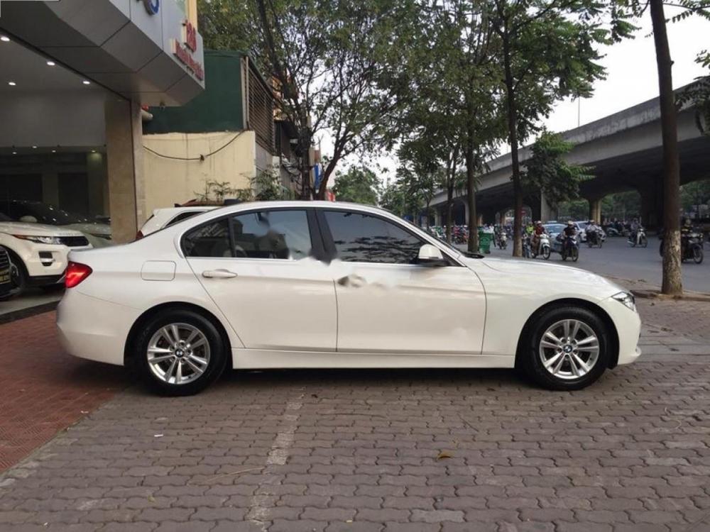 BMW 3 Series 320i 2015 - Cần bán lại xe BMW 3 Series 320i đời 2015, màu trắng, nhập khẩu như mới