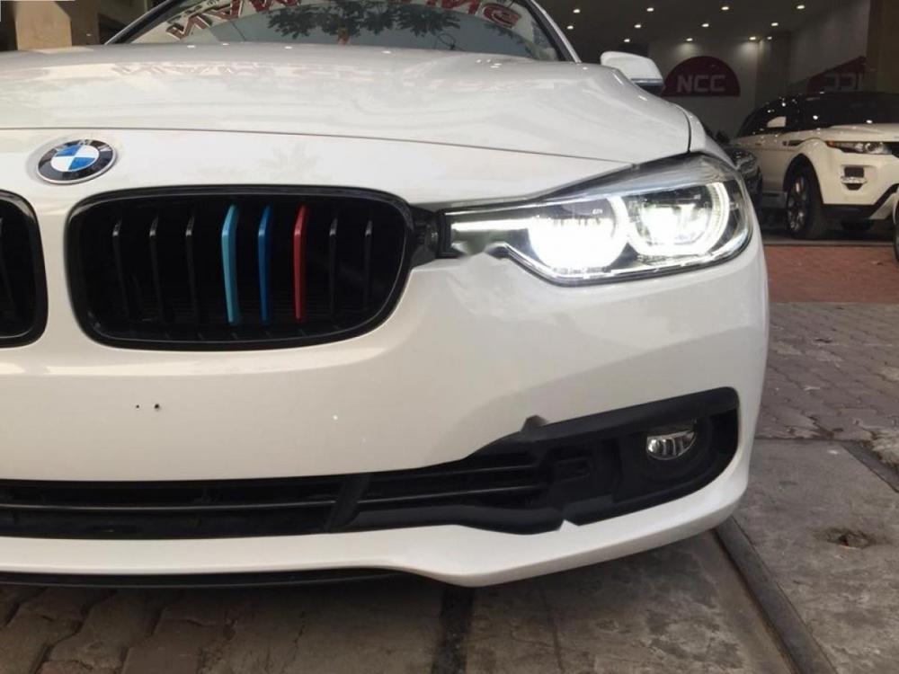 BMW 3 Series 320i 2015 - Cần bán lại xe BMW 3 Series 320i đời 2015, màu trắng, nhập khẩu như mới