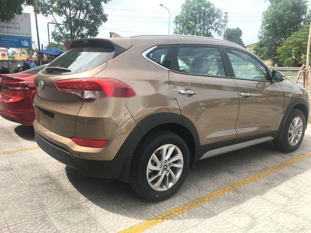 Hyundai Tucson    2018 - Cần bán Hyundai Tucson đời 2018, màu nâu, giá tốt