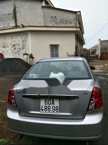 Daewoo Lacetti 1.6 EX 2009 - Bán ô tô Daewoo Lacetti 1.6 EX đời 2009, màu bạc chính chủ, giá chỉ 240 triệu